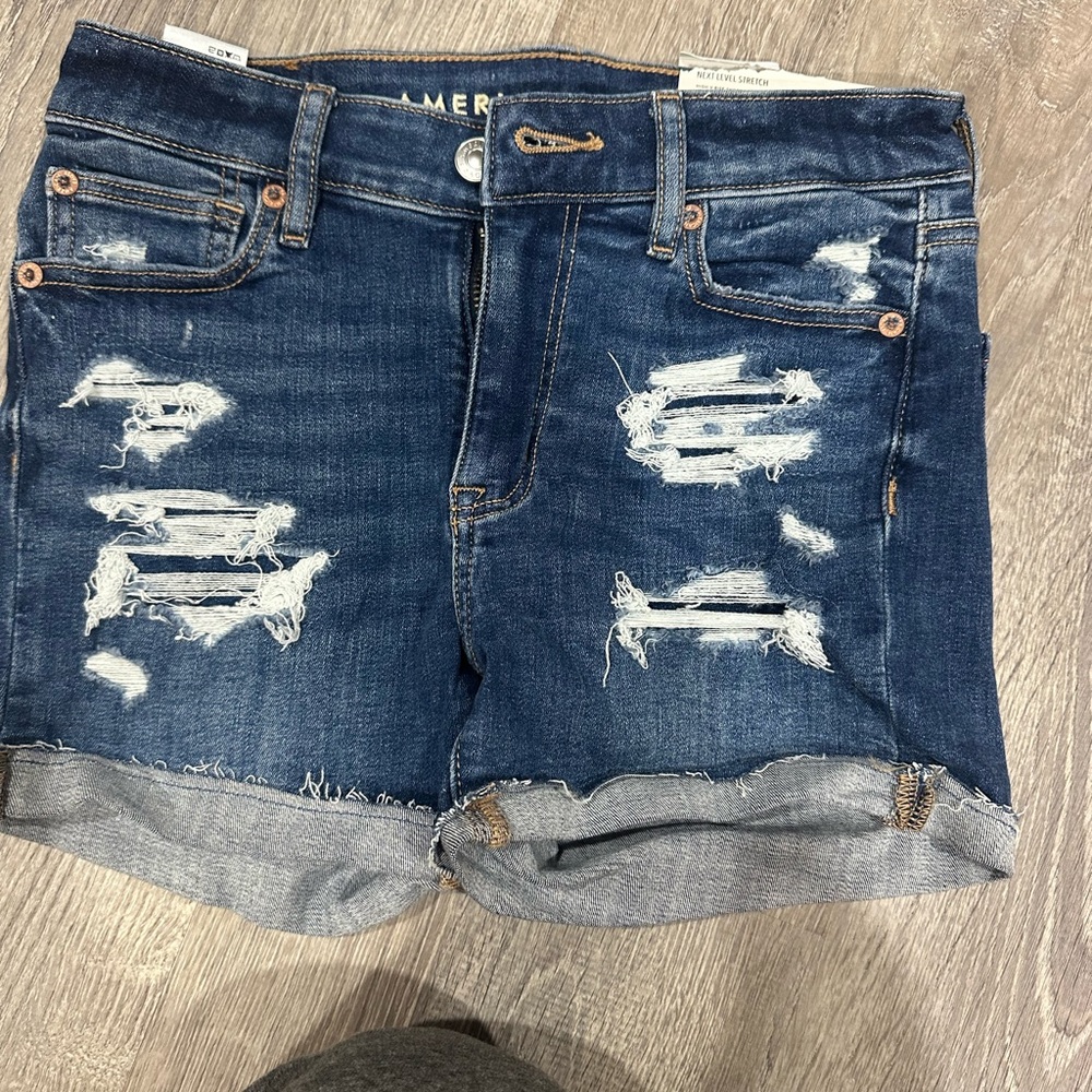 Woman’s American Eagle Jean distressed denim shorts. Size 0